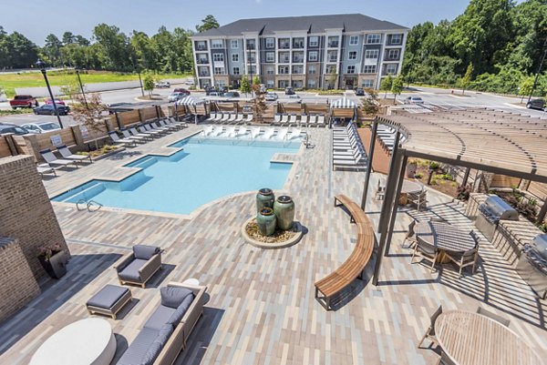 Luxurious pool area at Leigh House Apartments offering resort-style relaxation and modern comforts