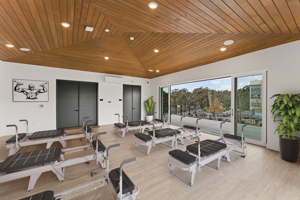 fitness center at Ascent at Campus of Life Apartments 