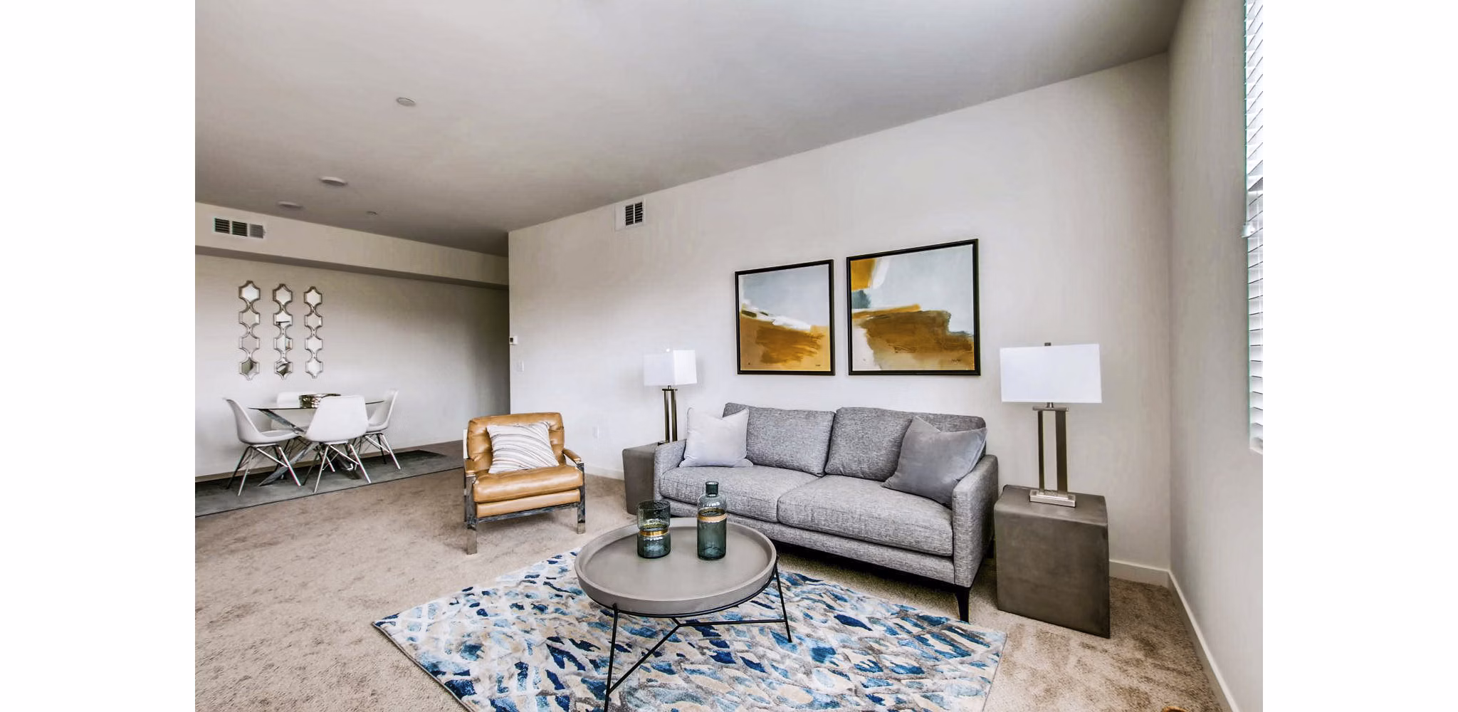 Spacious living room with modern furnishings at Ascent at Campus of Life Apartments