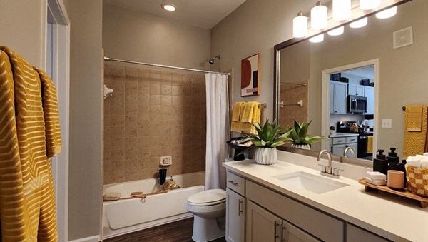 Spacious bathroom with modern fixtures at Grand Villas at Tuscan Lakes Apartments