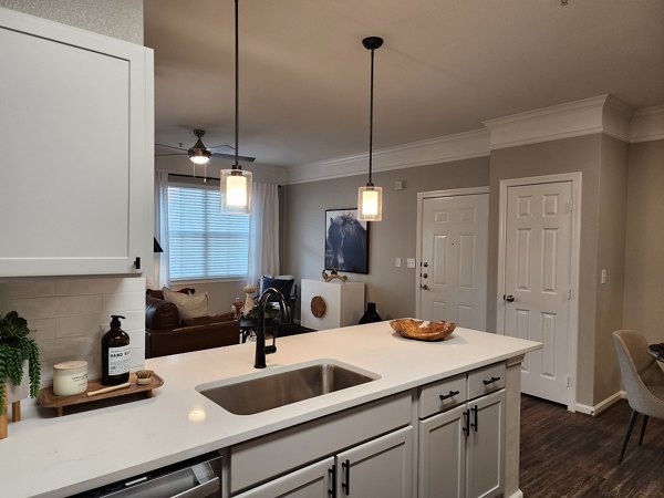 Spacious kitchen with modern appliances at Grand Villas at Tuscan Lakes Apartments