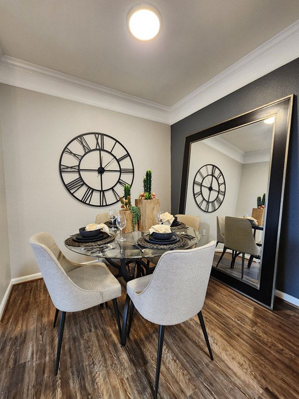 Elegant dining room with modern decor at Grand Villas at Tuscan Lakes Apartments