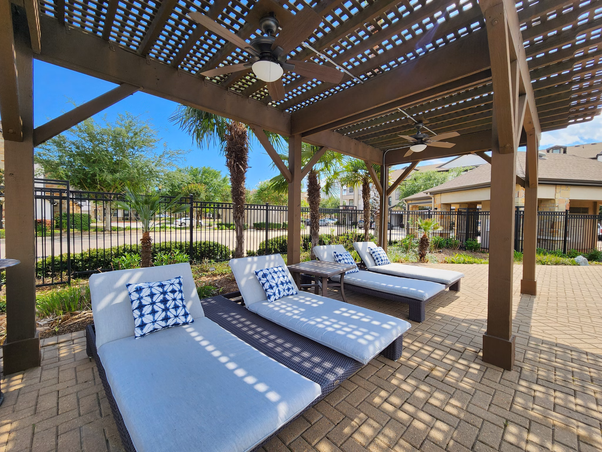 Grand Villas at Tuscan Lakes: Cozy patio with stylish seating for outdoor relaxation at premium apartments