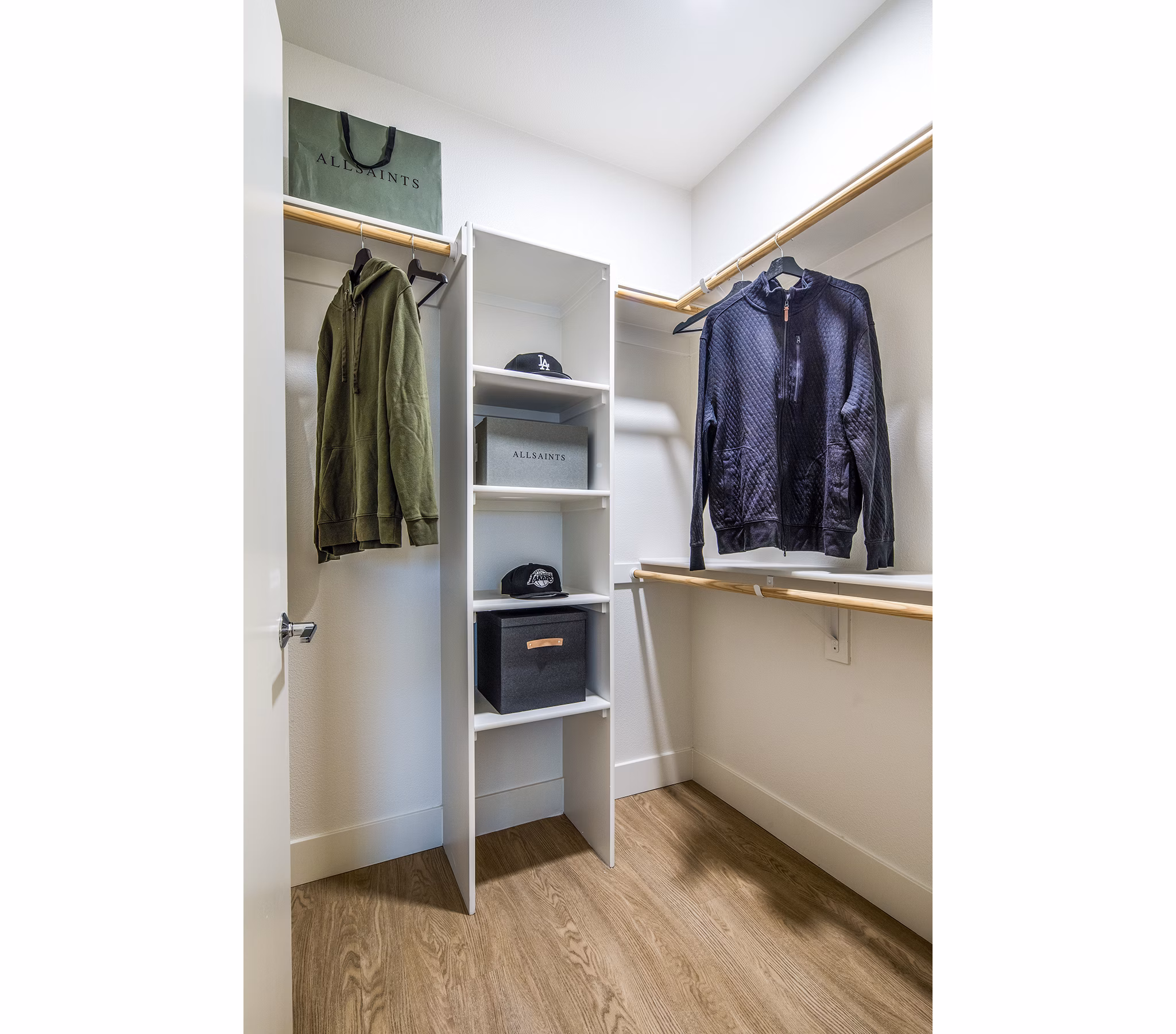 Bedroom closet with ample storage space at Llewellyn Apartments offering luxury living by Greystar