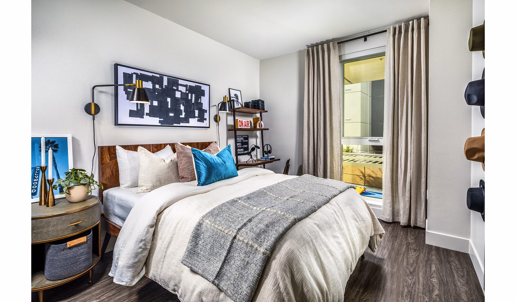 Walk-in closet with built-in shelving in a bedroom at Llewellyn Apartments