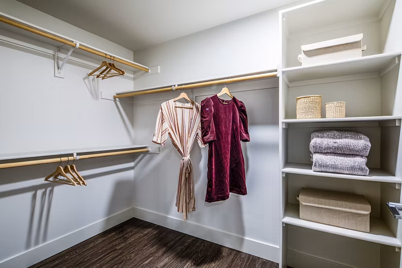 Cozy bedroom with modern decor at Llewellyn Apartments, Greystar luxury apartments in a vibrant urban environment