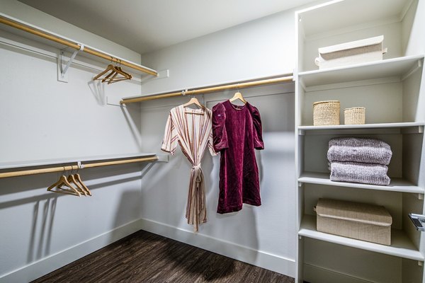 Cozy bedroom with modern decor at Llewellyn Apartments, Greystar luxury apartments in a vibrant urban environment