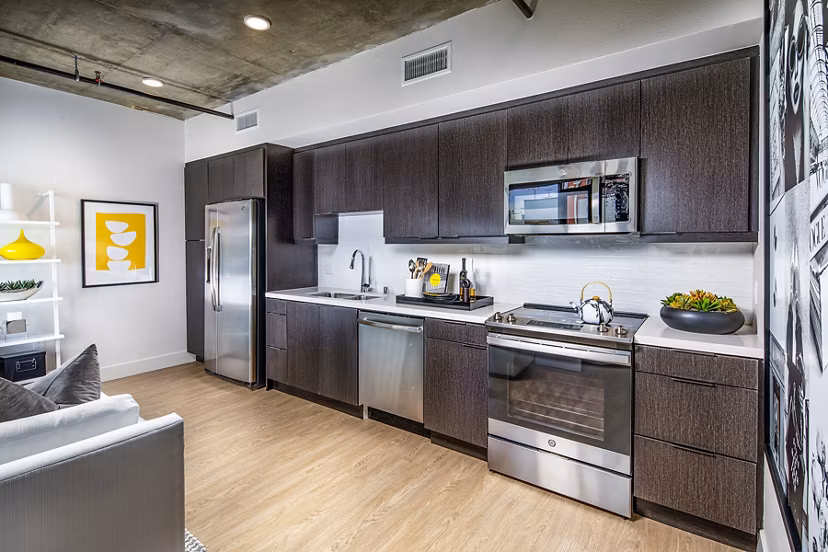 Modern kitchen with stainless steel appliances at Llewellyn Apartments, Greystar's luxury community in vibrant urban setting