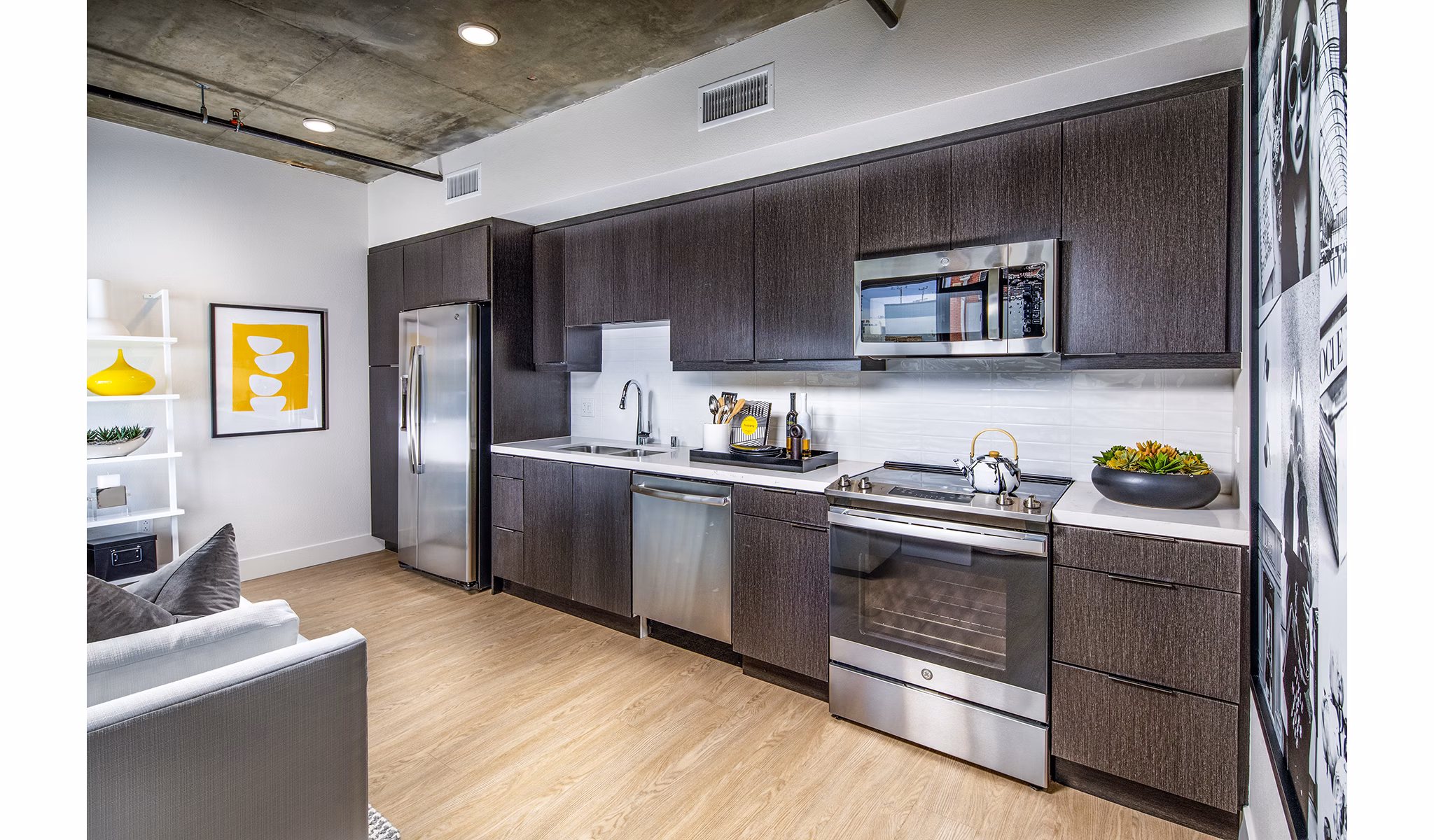 Modern kitchen with stainless steel appliances at Llewellyn Apartments, Greystar's luxury community in vibrant urban setting