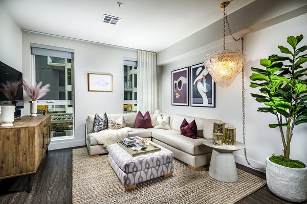 Spacious living room with stylish decor at Llewellyn Apartments