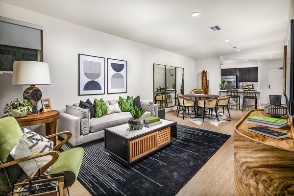 Spacious living room with modern decor in Llewellyn Apartments, offering luxury living at Greystar's premier Los Angeles location
