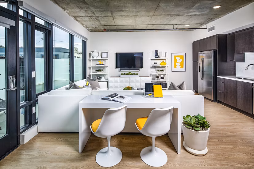 Modern living room with stylish furnishings at Llewellyn Apartments, a Greystar luxury community