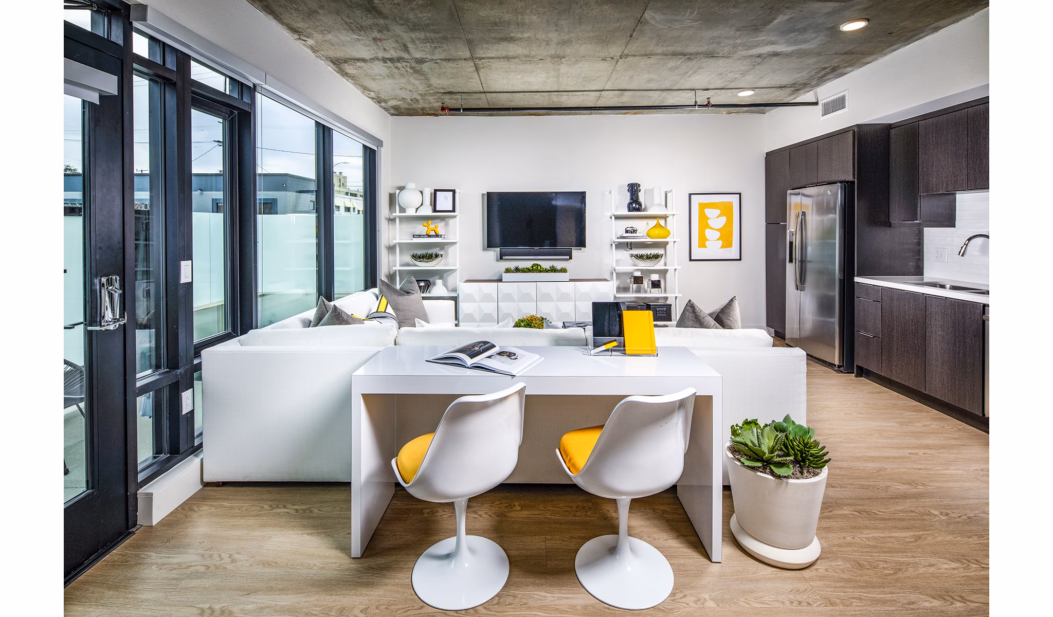 Modern living room with stylish furnishings at Llewellyn Apartments, a Greystar luxury community