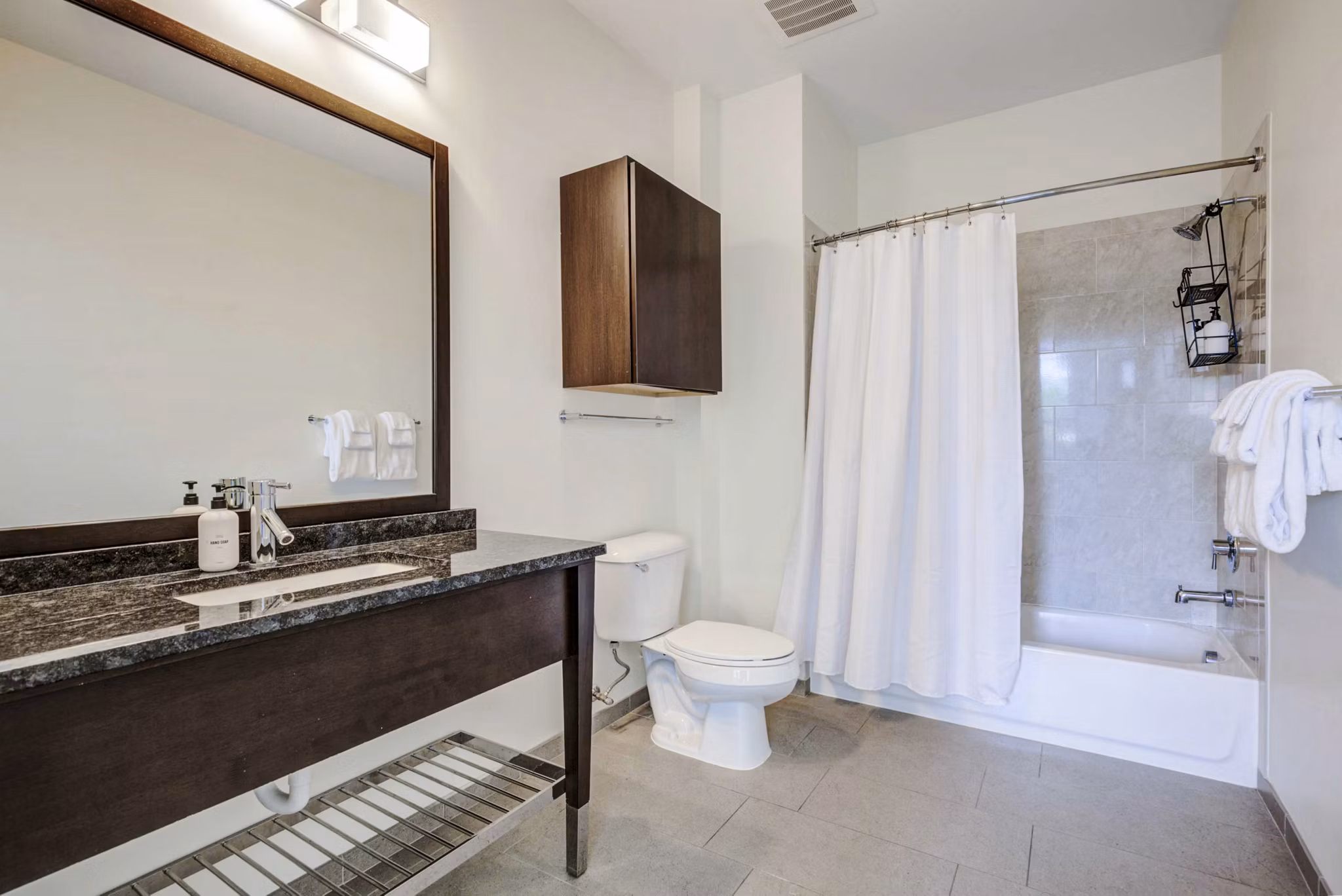 Bathroom featuring modern fixtures and spacious layout at DelRay Tower Apartments