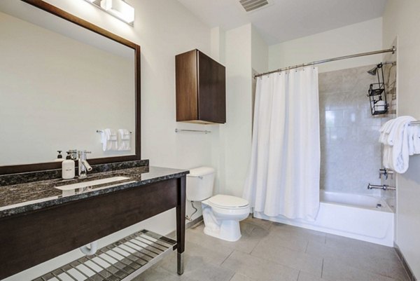 Bathroom featuring modern fixtures and spacious layout at DelRay Tower Apartments