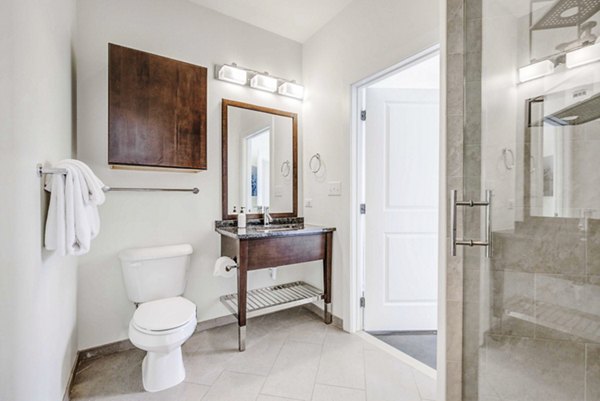 Modern bathroom with sleek fixtures at DelRay Tower Apartments