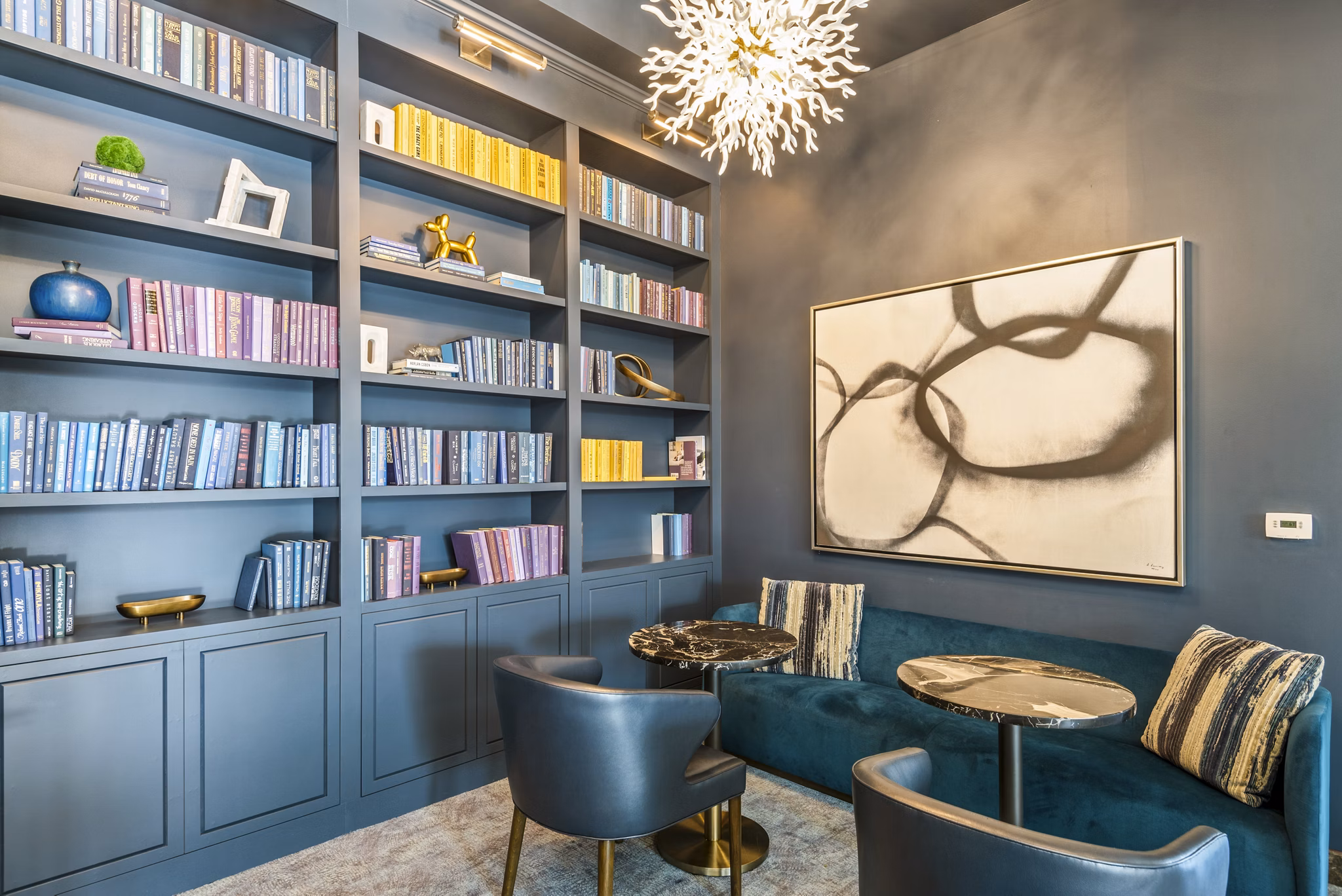 Modern clubhouse with lounge seating at DelRay Tower Apartments, Alexandria
