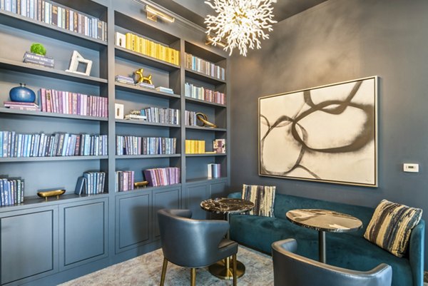 Modern clubhouse with lounge seating at DelRay Tower Apartments, Alexandria
