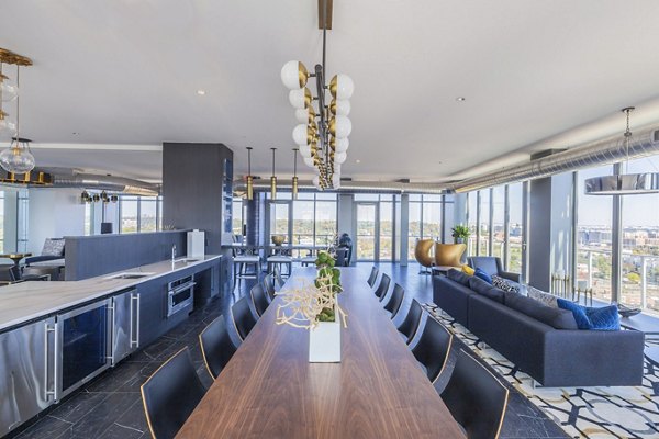 Clubhouse featuring modern lounge seating and entertainment area at DelRay Tower Apartments