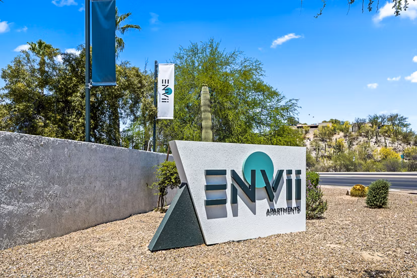 ENVii Apartments: Modern signage on luxury apartment building in downtown location