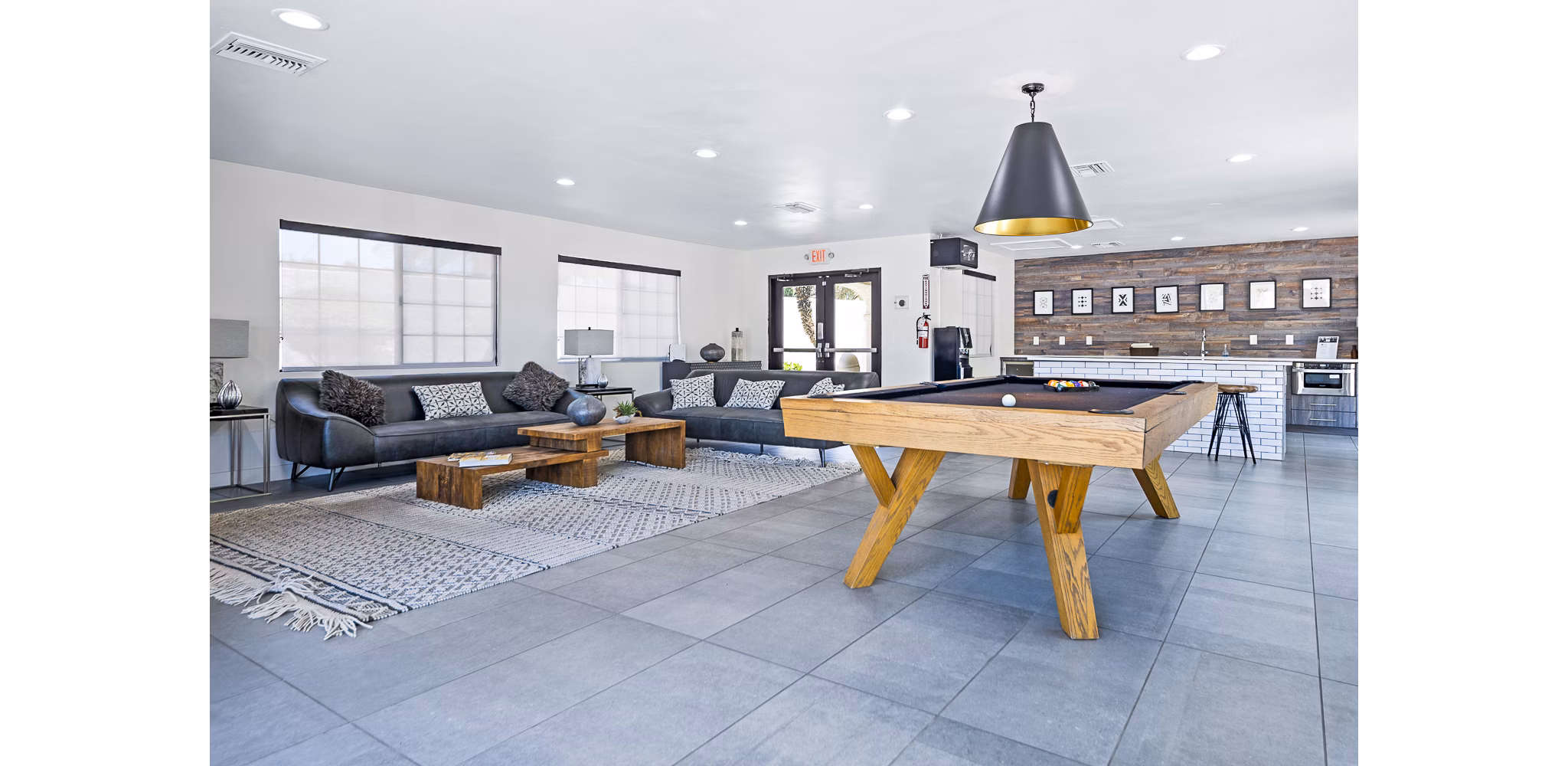 Clubhouse featuring modern design and stylish furnishings at ENVii Apartments
