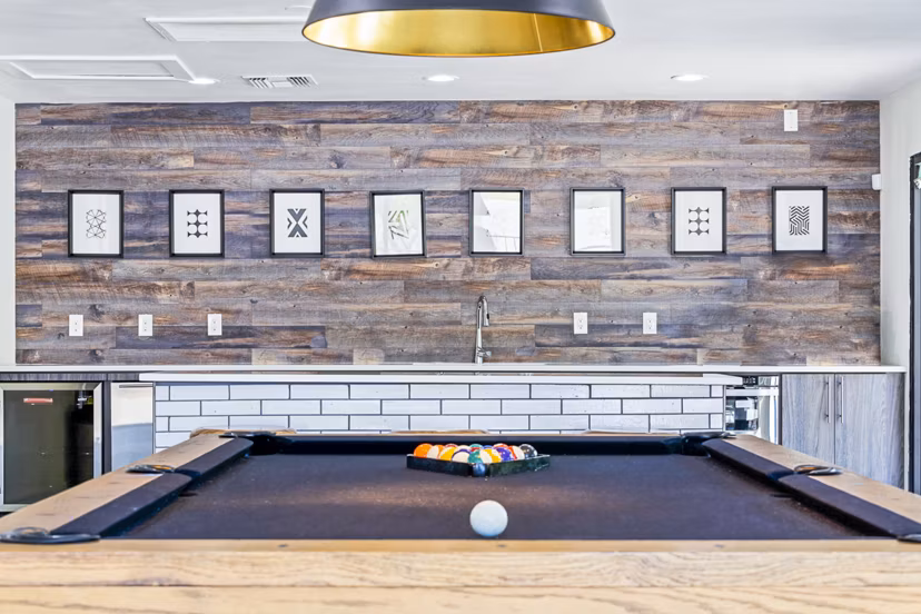 Contemporary clubhouse with stylish seating at ENVii Apartments