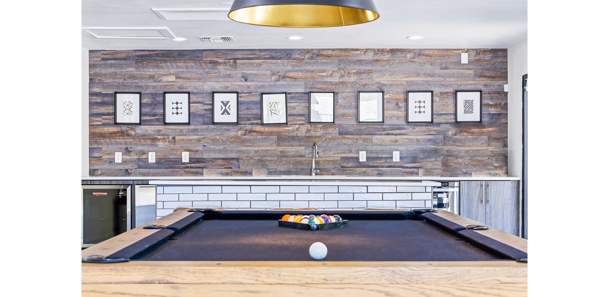 Contemporary clubhouse with stylish seating at ENVii Apartments