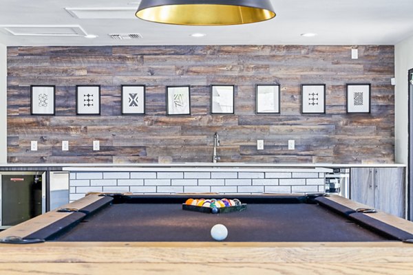 Contemporary clubhouse with stylish seating at ENVii Apartments