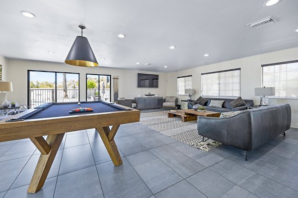 Clubhouse with modern furnishings and communal areas at ENVii Apartments, a luxurious Greystar community