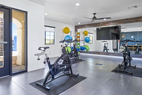 Yoga and spin studio with modern equipment at ENVii Apartments