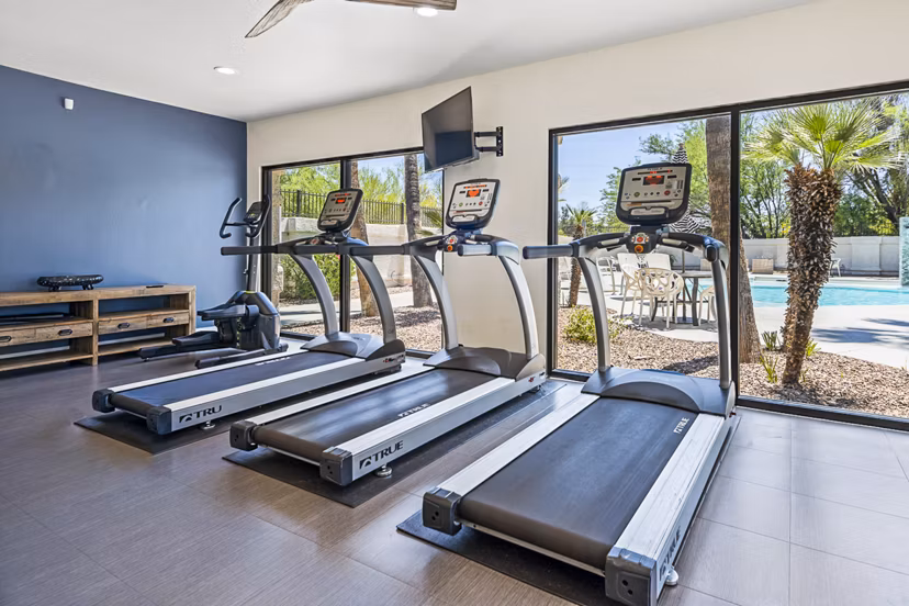 Modern fitness center with state-of-the-art equipment at ENVii Apartments