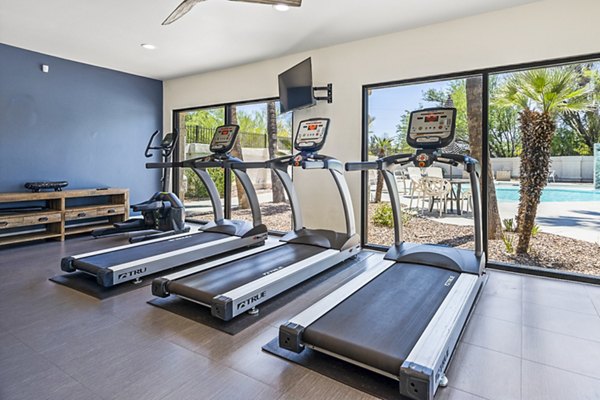 Modern fitness center with state-of-the-art equipment at ENVii Apartments