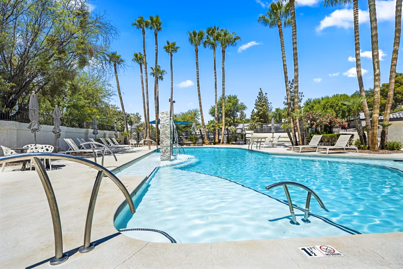 Rooftop pool with city views at ENVii Apartments, a luxury Greystar property in urban setting