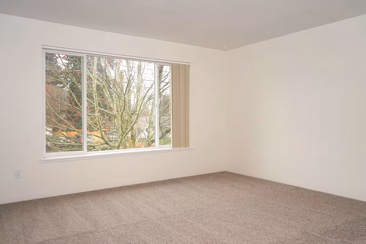 Spacious bedroom with contemporary design in Lancaster Terrace Apartments