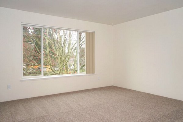 Spacious bedroom with contemporary design in Lancaster Terrace Apartments