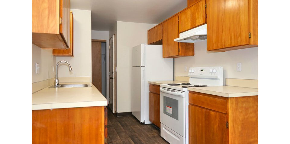 Stylish kitchen with modern appliances in Lancaster Terrace Apartments, ideal for cooking enthusiasts seeking luxury living