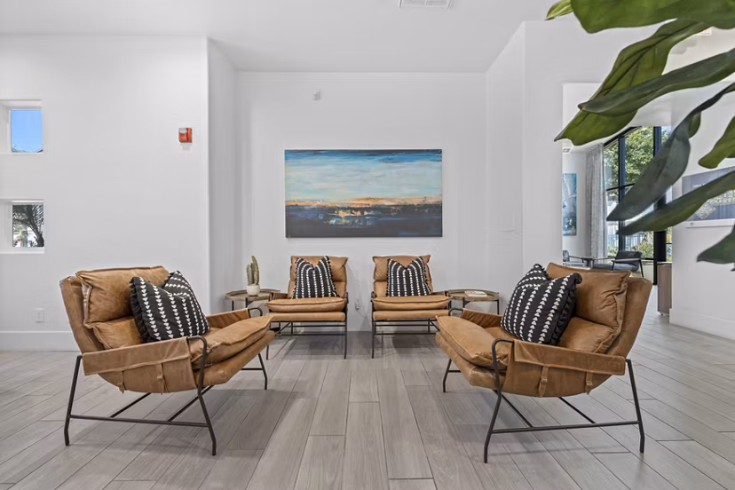 Modern clubhouse with stylish furnishings at Tempe Station Apartments: A Greystar luxury living experience in Tempe