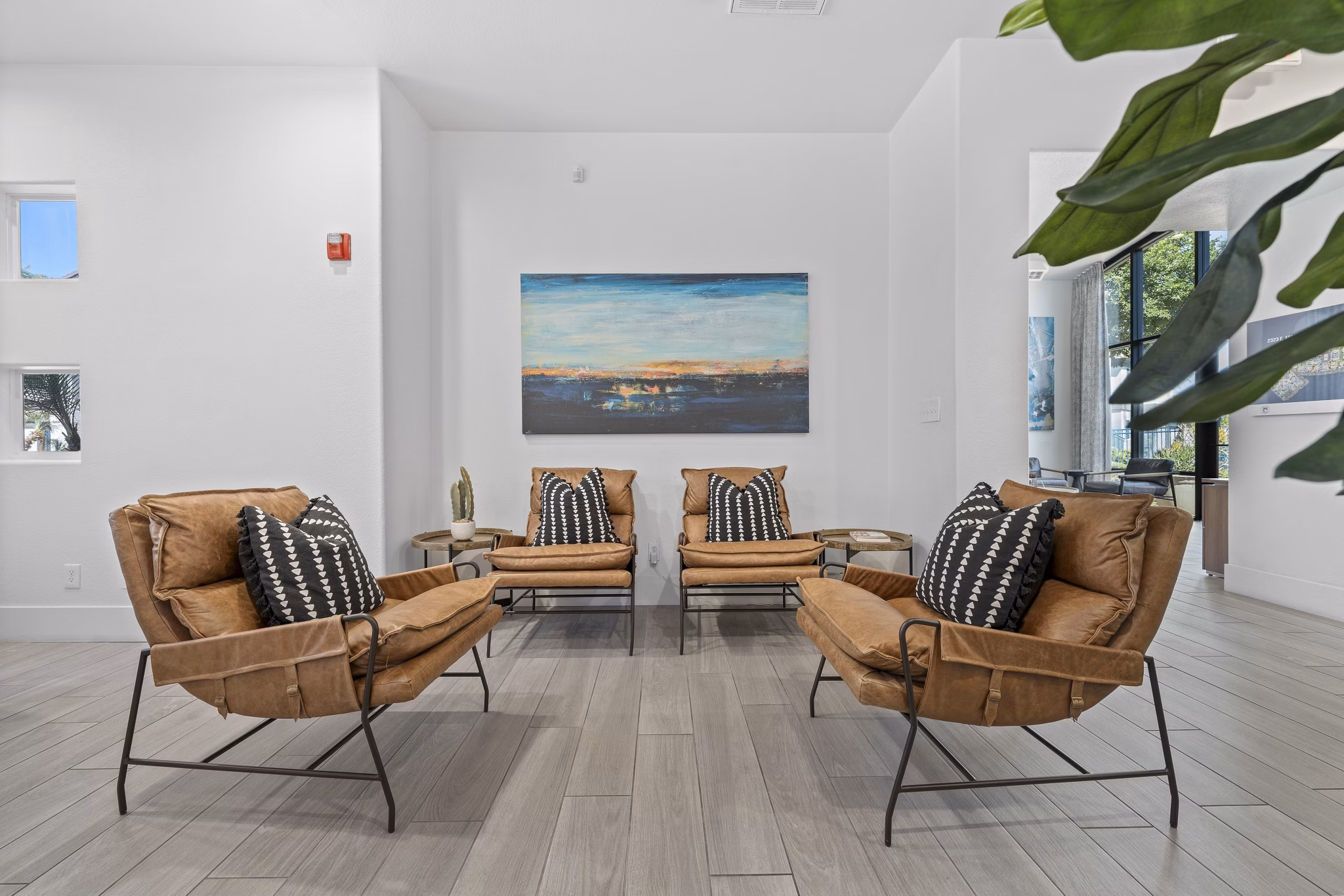 Modern clubhouse with stylish furnishings at Tempe Station Apartments: A Greystar luxury living experience in Tempe