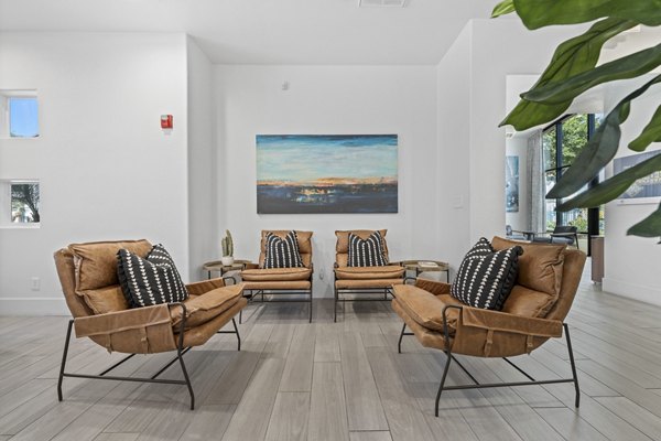 Modern clubhouse with stylish furnishings at Tempe Station Apartments: A Greystar luxury living experience in Tempe