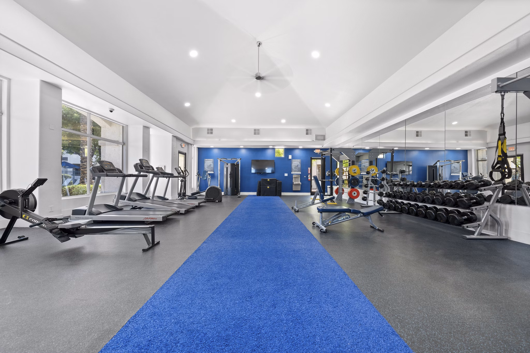 State-of-the-art fitness center at Tempe Station Apartments with modern equipment and spacious workout areas