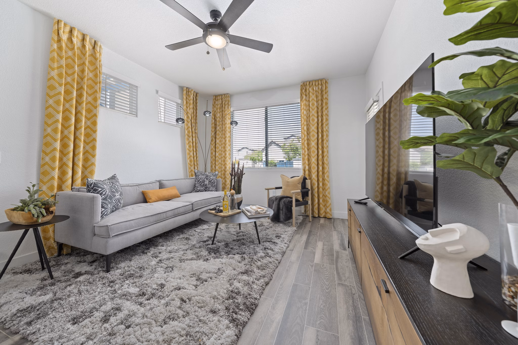 Spacious living room with modern decor at Tempe Station Apartments luxury units in the heart of Tempe