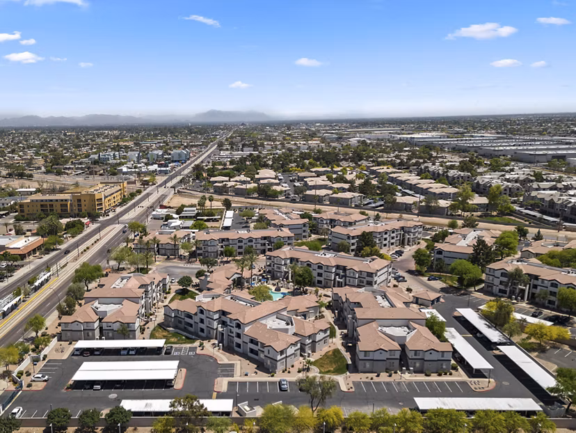Scenic view of luxury apartments at Tempe Station featuring lush landscaping and modern architecture