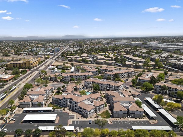 Scenic view of luxury apartments at Tempe Station featuring lush landscaping and modern architecture