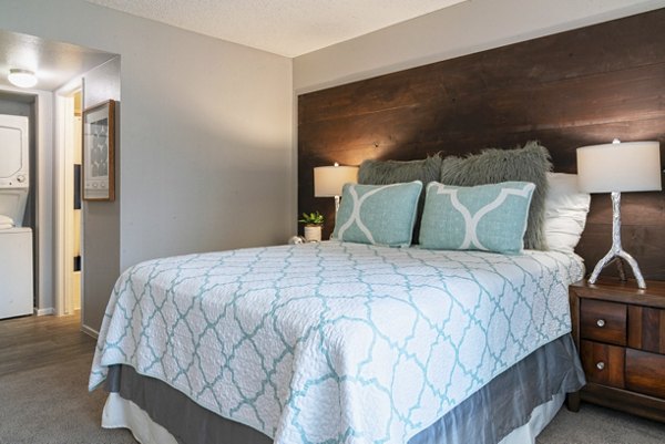 Cozy bedroom with elegant decor at Westmount at Urban Trails Apartments, showcasing modern luxury living