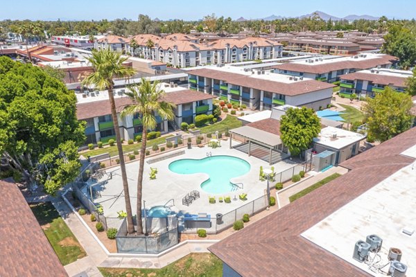 Westmount at Urban Trails: Scenic view of modern luxury apartments featuring lush landscaping and outdoor walking trails