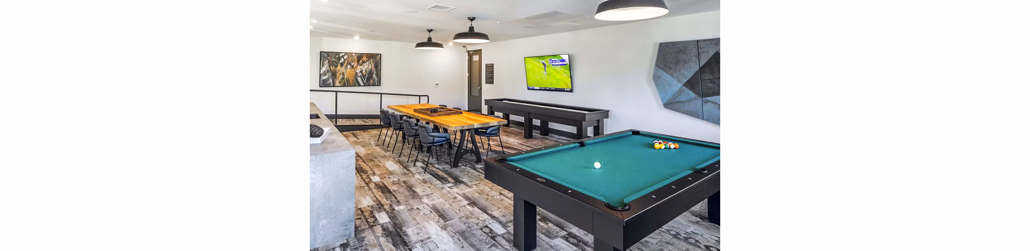 clubhouse/kitchen/game room at Astikos Lofts Apartments