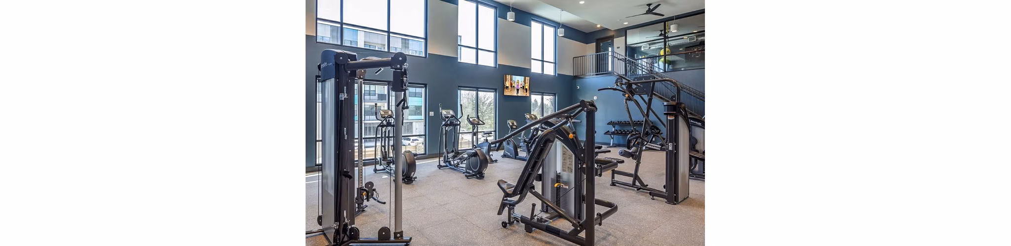 fitness center at Astikos Lofts Apartments
