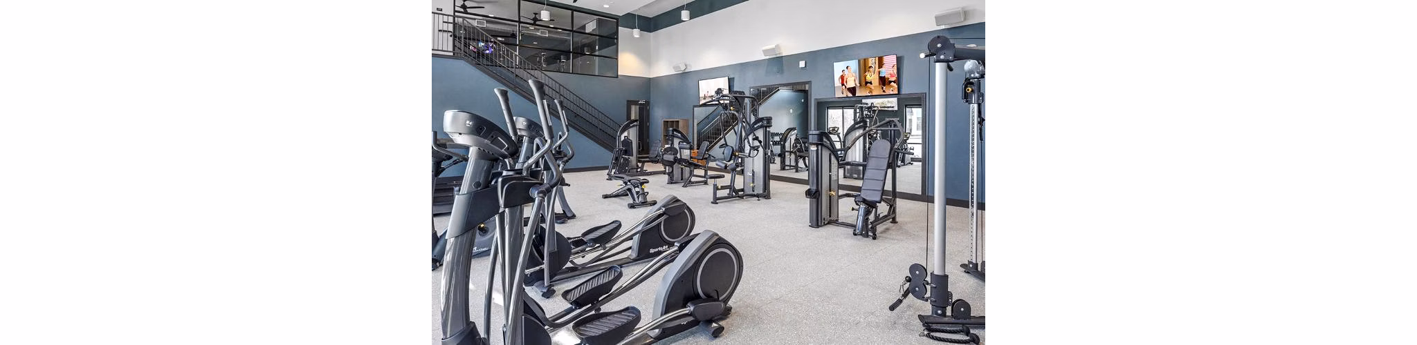 fitness center at Astikos Lofts Apartments