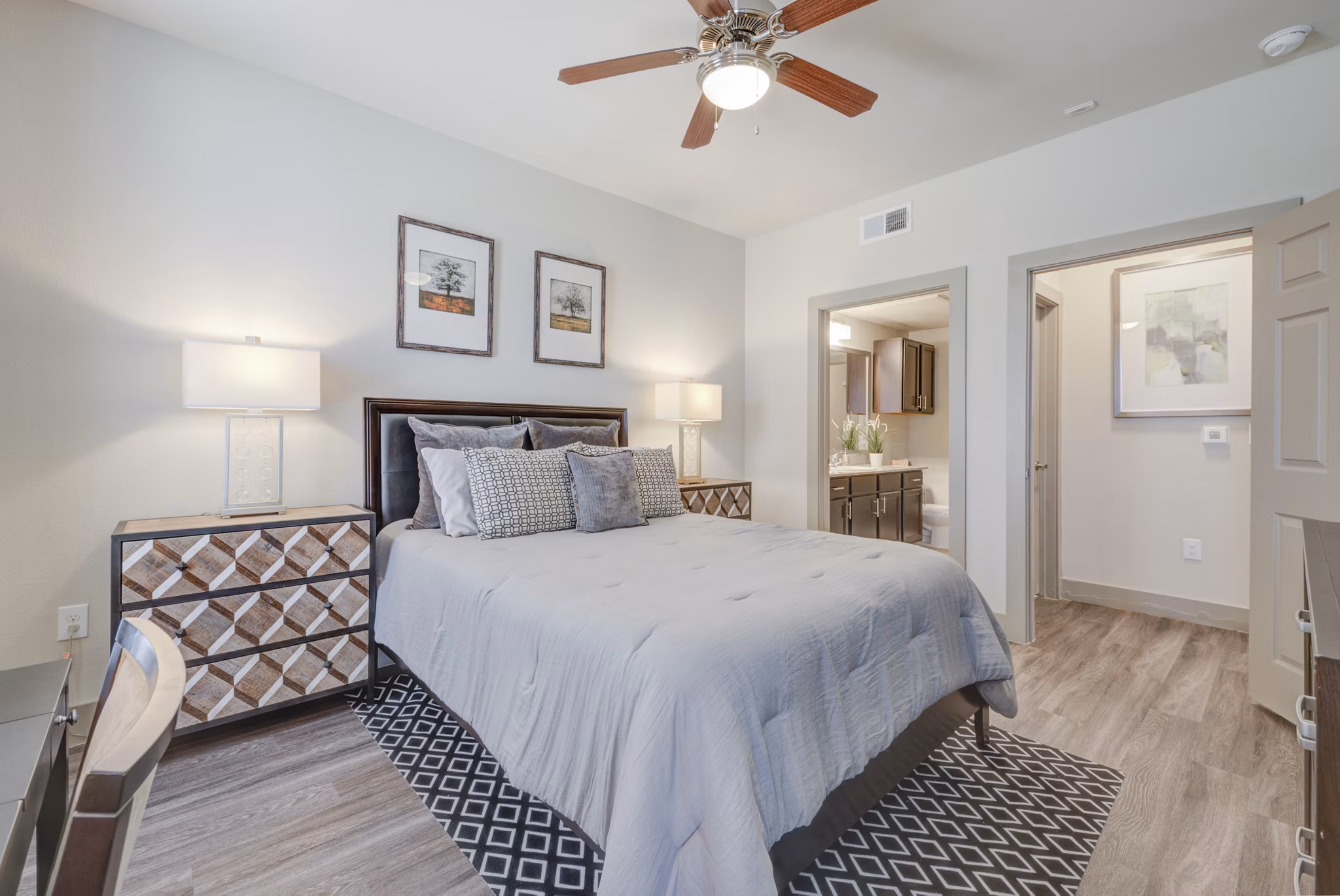 Cozy bedroom with stylish decor in Lone Oak Apartments