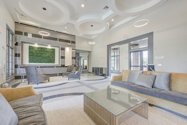 Clubhouse with modern design and seating areas at Lone Oak Apartments for social gatherings and events